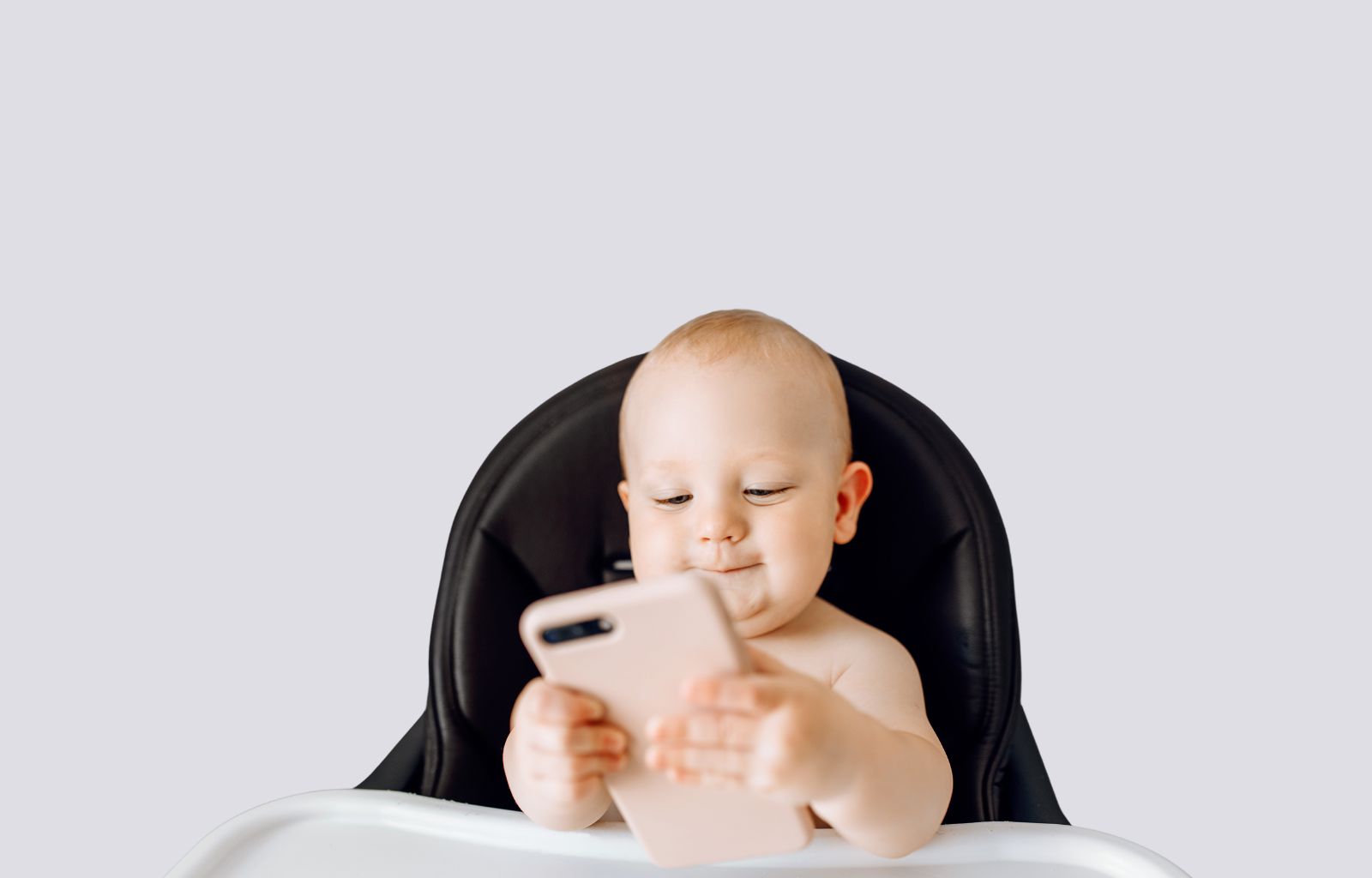 baby looking at phone